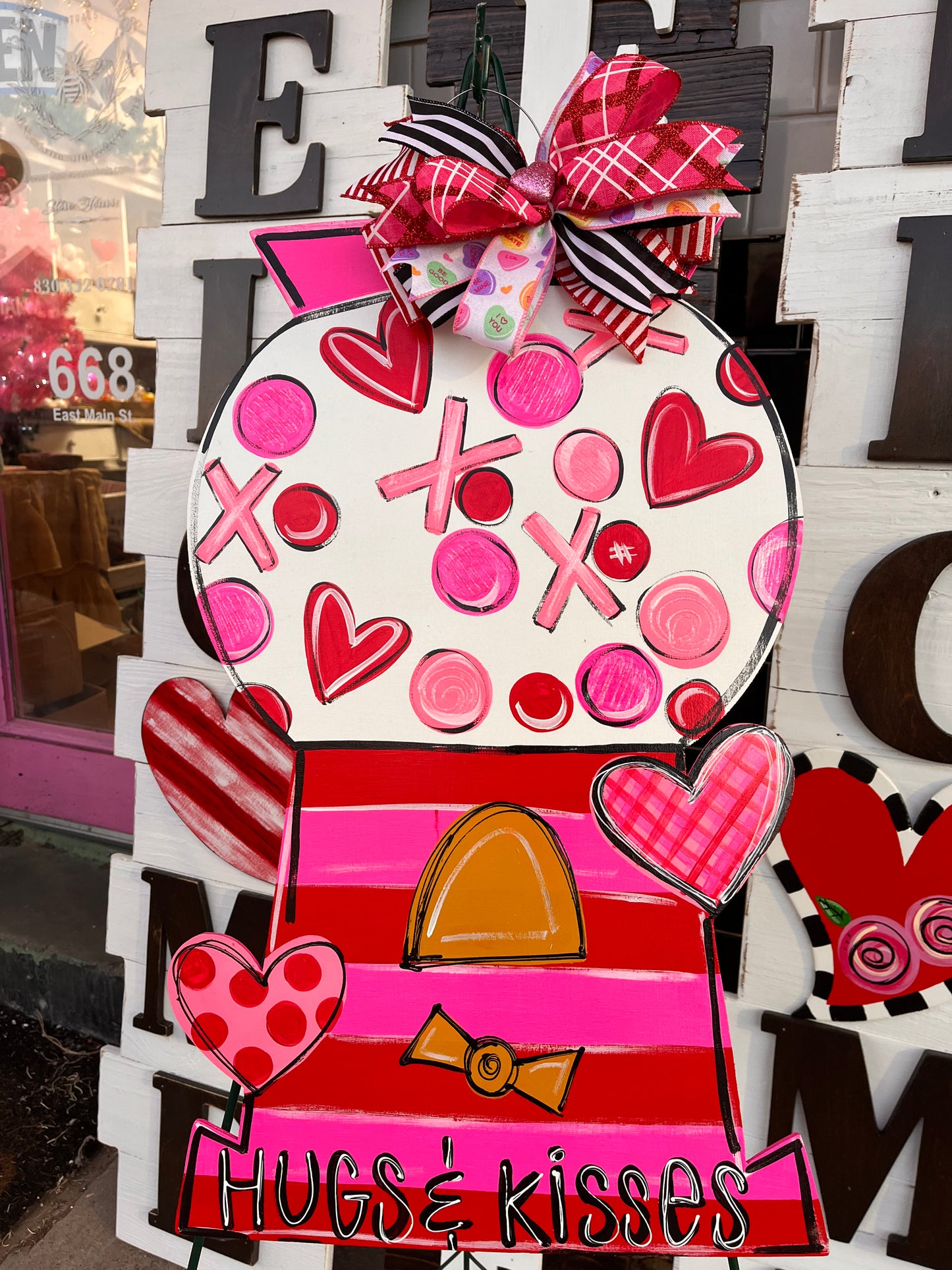 Gumball machine door hanger